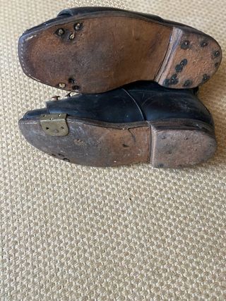 Botas, taco e bola de Hóquei anos 50