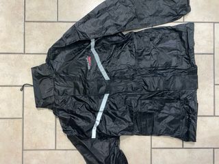 Spark tuta antipioggia professionale.