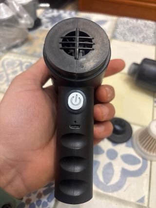 Pistola aspiradora recargable