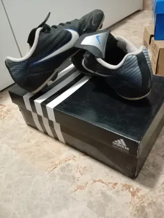 Zapatillas Nike niño tacos negras y azules talla