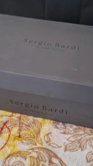Mocasines Sergio Bardi negros con cadena