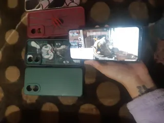 Oppo A18 Negro 128GB Como Nuevo con 5 fundasy cabl