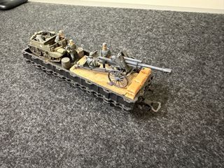 Vagón militar con cañón y figuras. Trenes H0