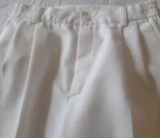 Traje de comunión azul con detalles dorados