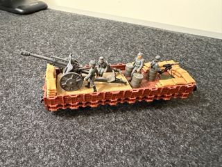 Vagón militar con cañón y figuras. Trenes H0