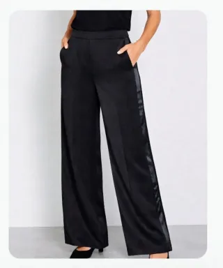 Pantalón smockint negro KIABI mujer.