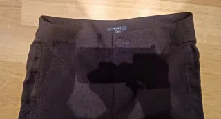 Pantalón smockint negro KIABI mujer.