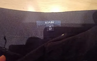 Pantalón smockint negro KIABI mujer.