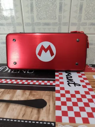 Custodia Nintendo Switch Mario + SD 128GB