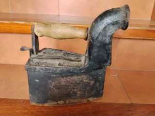 Plancha de carbón antigua