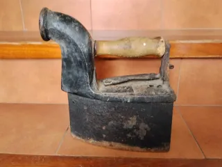 Plancha de carbón antigua