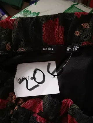 Falda larga floral negra y rosa