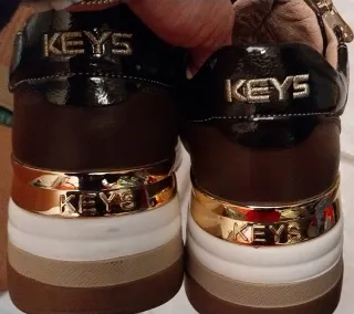 Zapatillas deportivas mujer marrón y oro