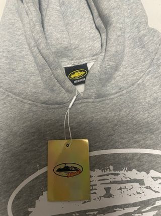 Sudadera gris marca corteiz