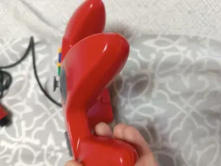 Mando N64 Rojo + Super Smash Bros.