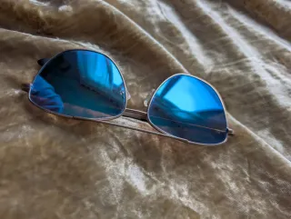 Gafas de sol Hawkers doradas y azules