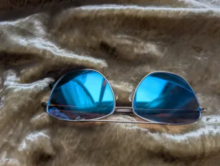 Gafas de sol Hawkers doradas y azules