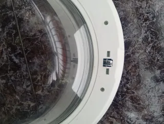 Maneta y cristal lavadora Indesit