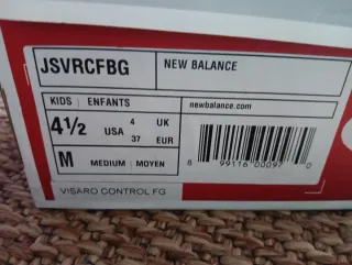 T. 37 kids ..4 1/2 Botas de fútbol New Balance Tal