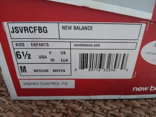 T. 39 kids 6 1/2 Botas de fútbol New Balance Talla