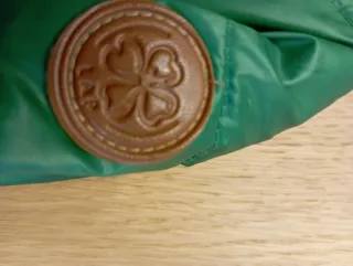 Plumífero corto y ligero verde