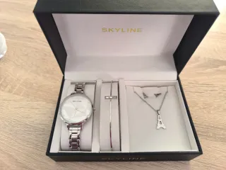 Conjunto de reloj y pulsera plateados