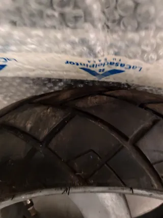 Rueda trasera Piaggio nrg