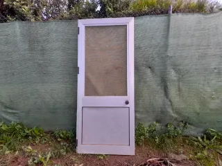 Puerta aluminio con mosquitera