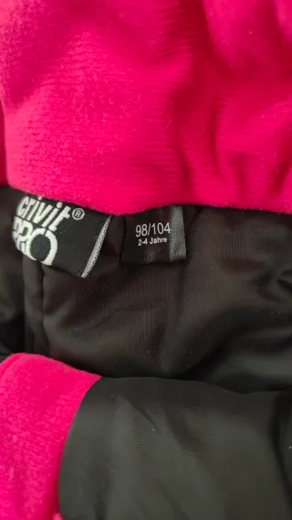 Conjunto de esquí para niña rosa.