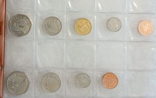 Monete Barbados e Bahamas