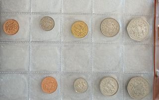 Monete Barbados e Bahamas