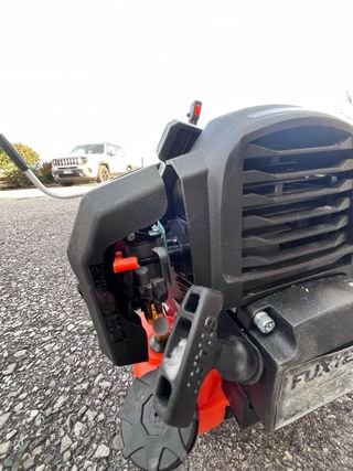 Decespugliatore con tracolla