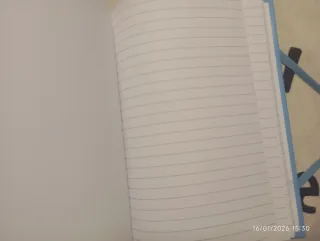 Libreta nueva azul con plumas y goma