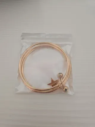 Bracciale dorato con ciondolo a stella