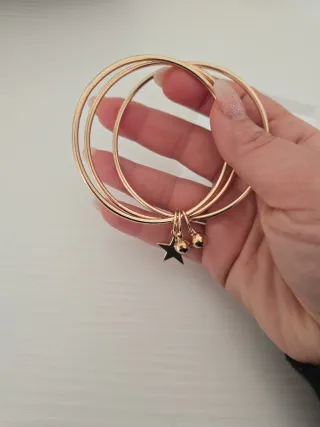 Bracciale dorato con ciondolo a stella