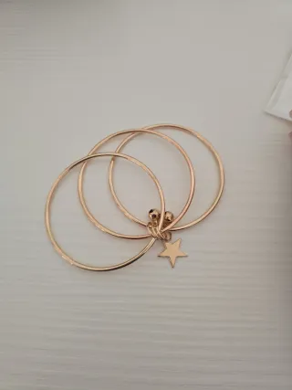 Bracciale dorato con ciondolo a stella