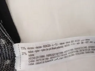 Top negro con topos blancos