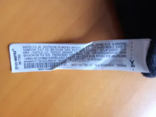 Vestido de punto de Zara negro trenzado.