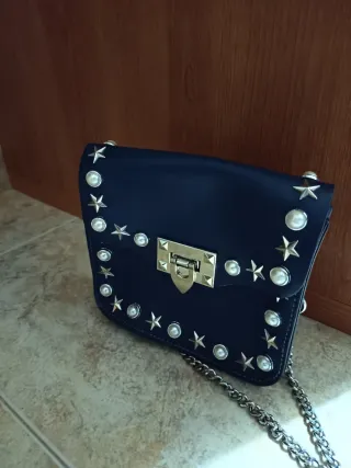 Bolso piel azul con estrellas y perlas