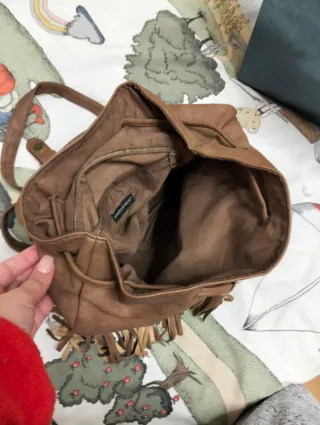 Bolso mochila marrón con flecos