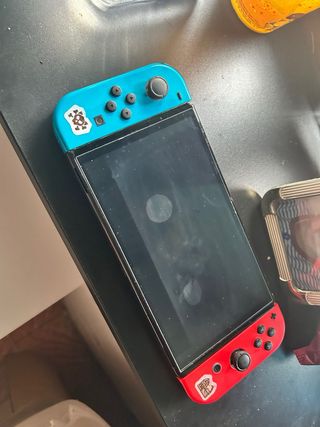 Nintendo Switch OLED + 3 giochi + custodia + vetro