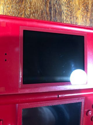 Console Nintendo Ds rosso con caricatore leggere