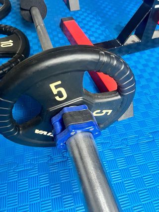 Set de halterofilia barra olímpica y discos