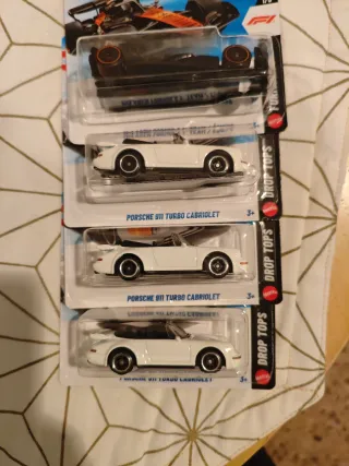 Hotwheels Porsche 911 Turbo Cabriolet y F1