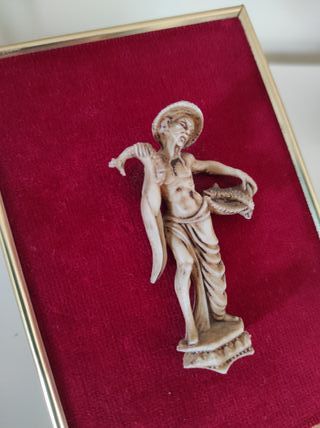Figura oriental pescador