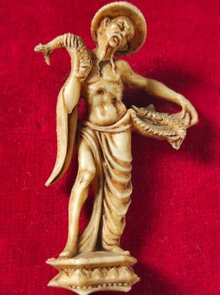 Figura oriental pescador