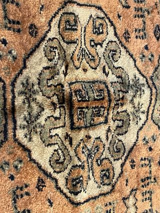 Alfombra vintage beige y naranja