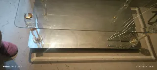 Mesa de centro cristal y metal dorado