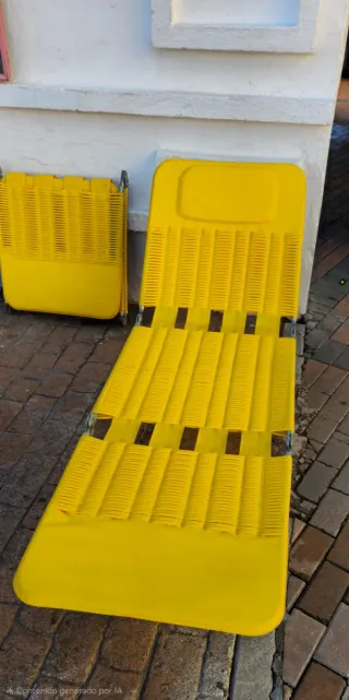 Tumbona plegable amarilla