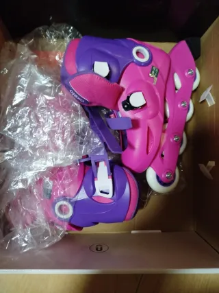 Patines infantiles Oxelo rosas y morados